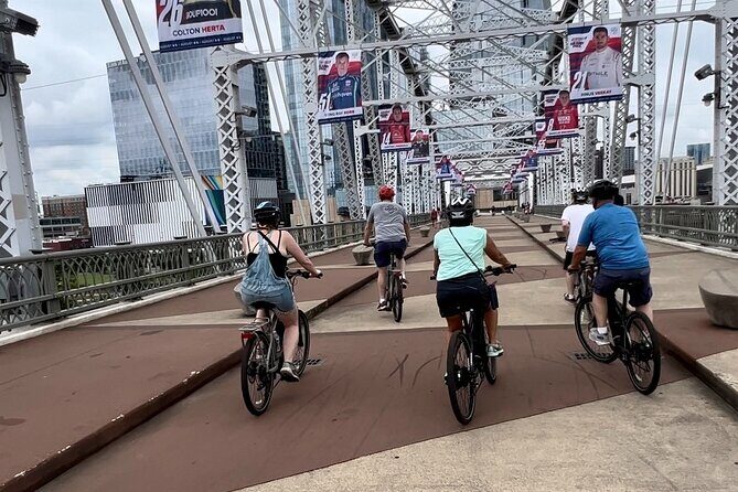 Downtown Nashville's Hidden Gems E-bike Tour - The John Seigenthaler Pedestrian Bridge: skyline views over the Cumberland